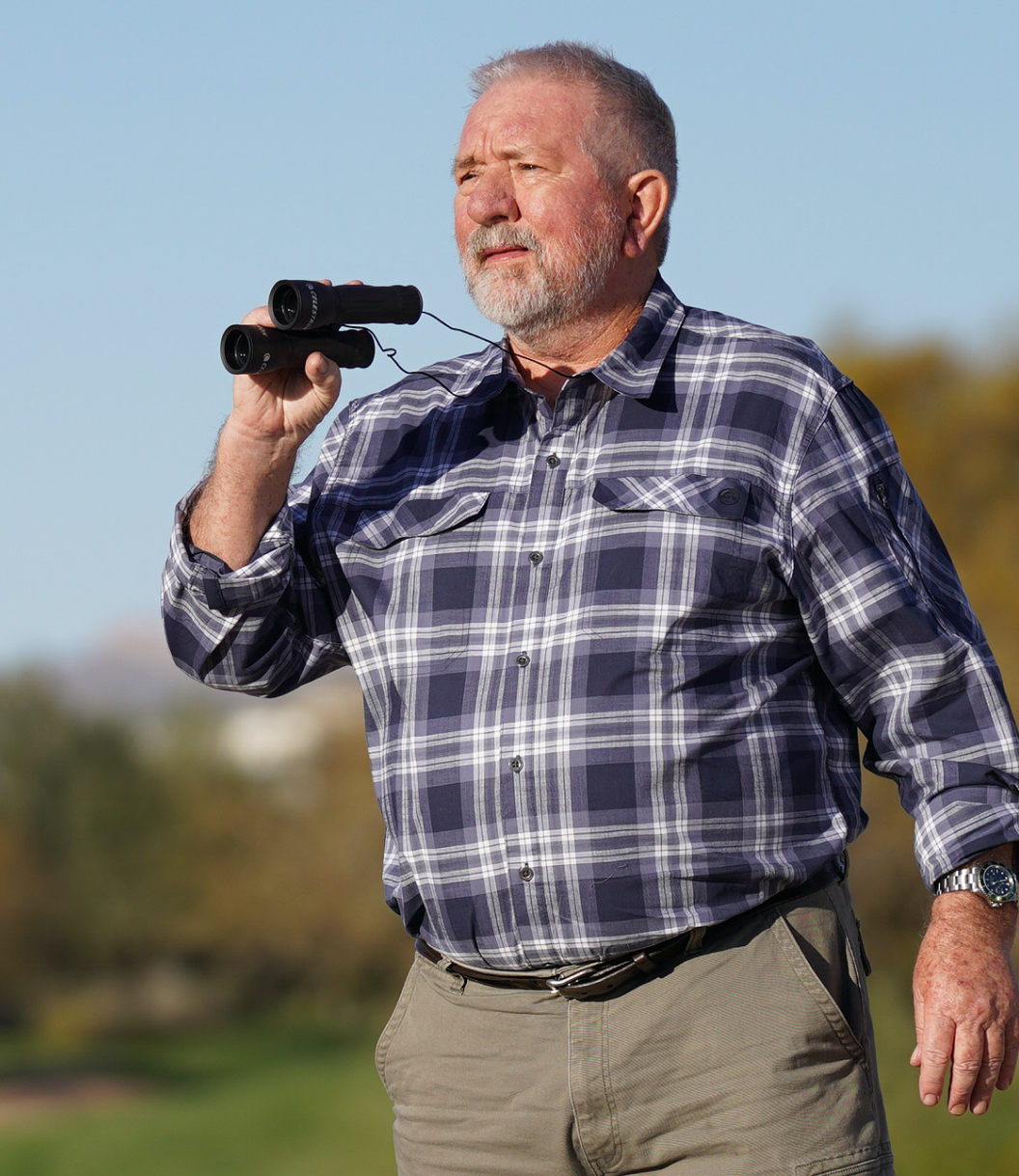 Acthar Gel patient: Gary outdoors with binoculars